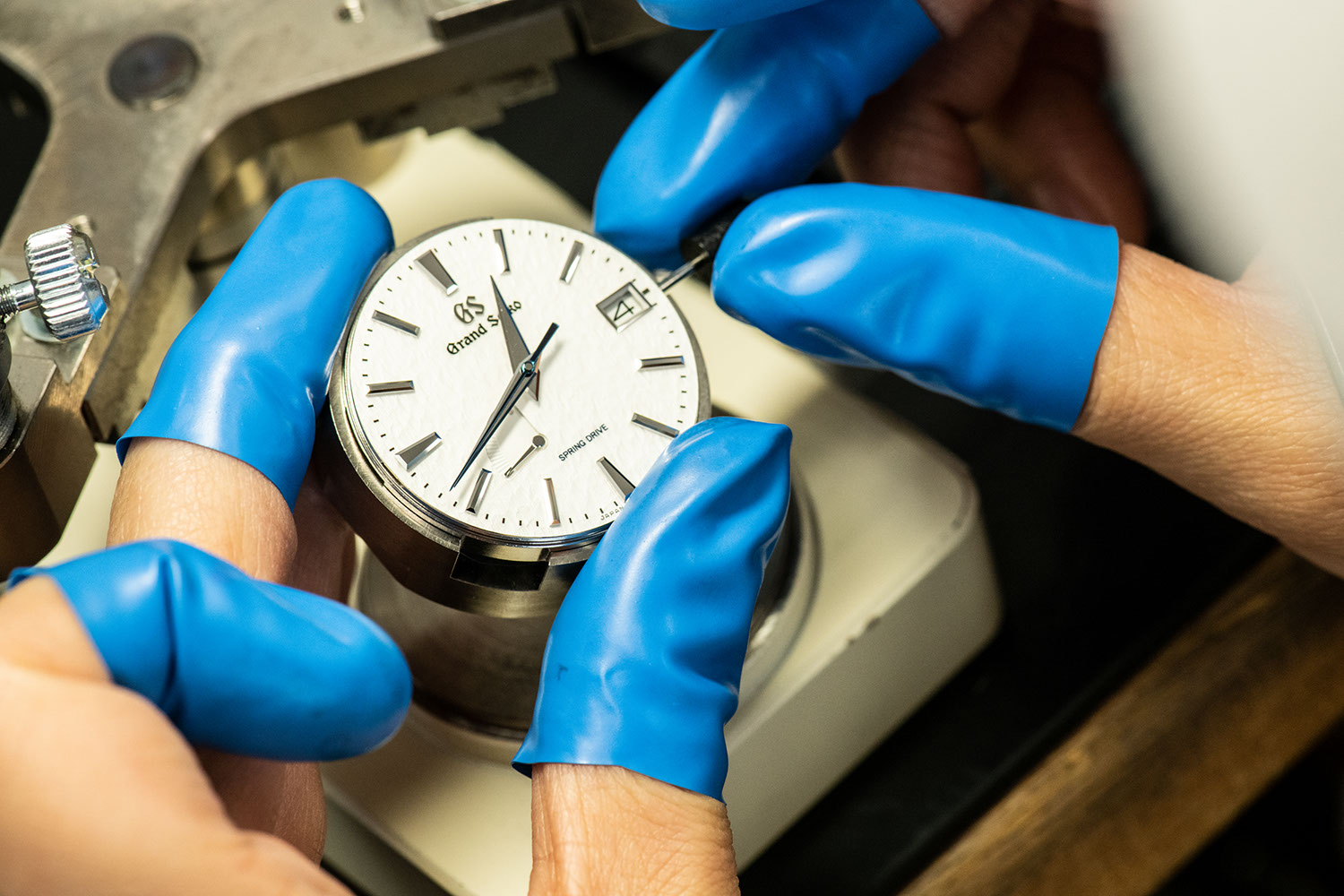 Inspecting a bare Grand Seiko SBGA211 'Snowflake' (Image: Grand Seiko)