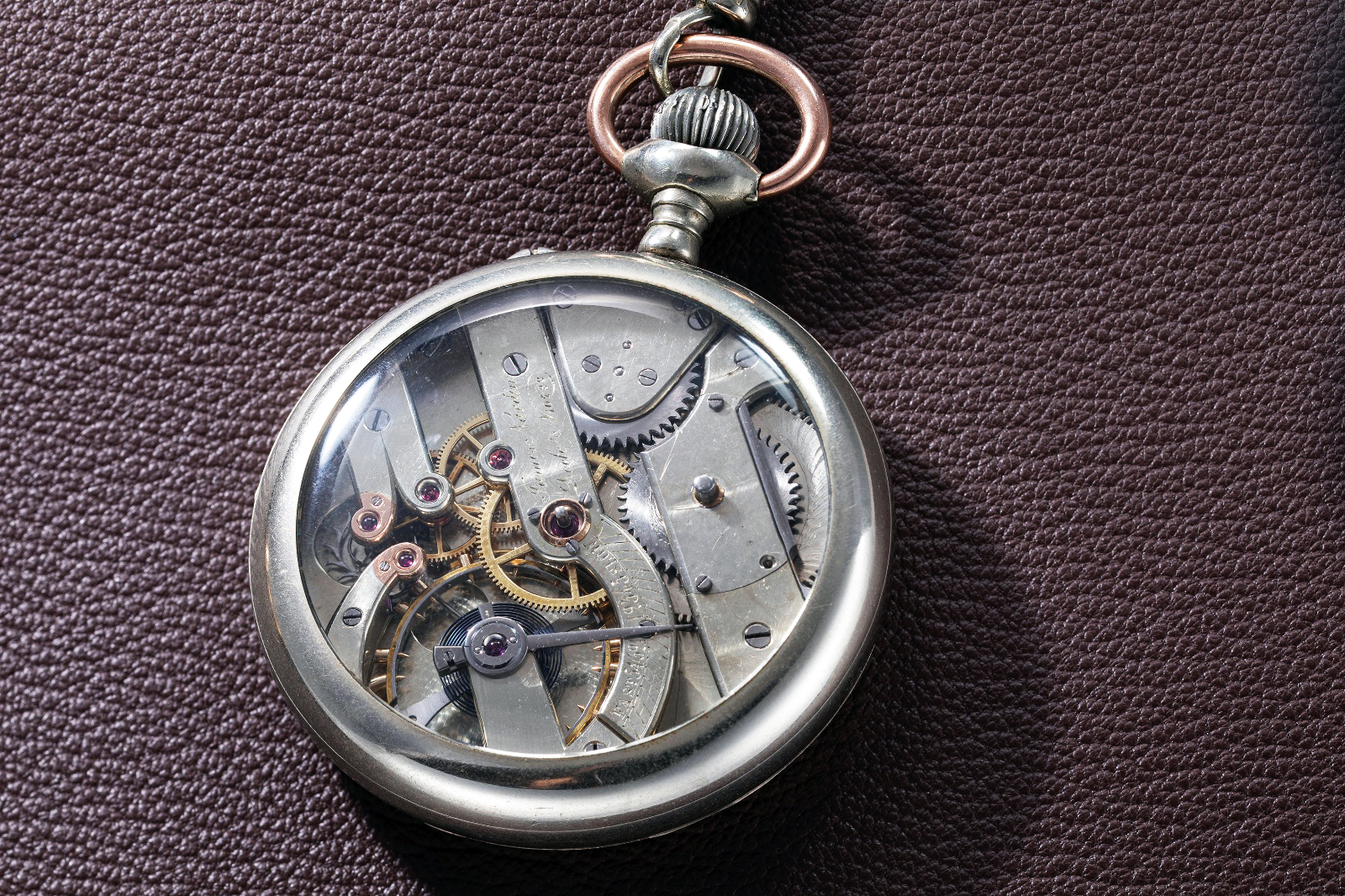 Open caseback view of a Jules Jürgensen pocket watch showcasing traditional mechanical movement (Image: Revolution©)