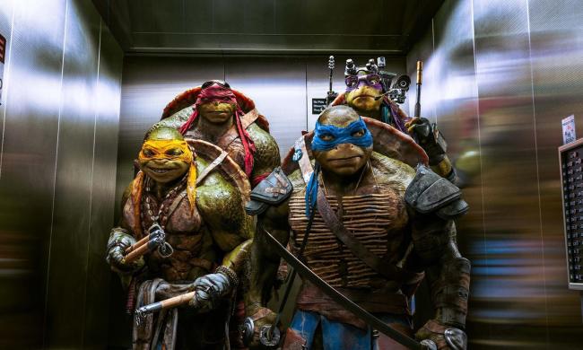 The Teenage Mutant Ninja Turtles in an elevator.